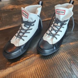 Women size 7.5 black and white waterproof boots